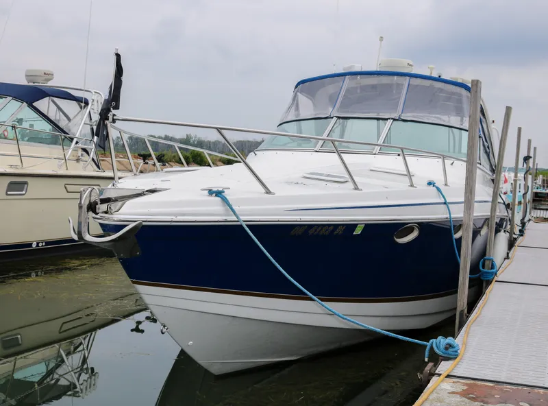 Slide: The Image of 2003 Formula 370 Super Sport boat docked at a marina. - 1