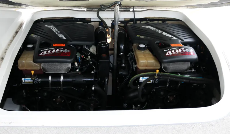 Slide: The Image of Twin Mercury 496 engines in a 2003 Formula 370 Super Sport boat. - 27