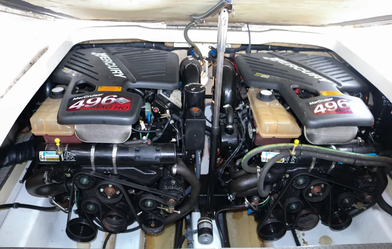 Slide: The Image of Twin Mercury 496 engines in a 2003 Formula 370 Super Sport boat. - 29