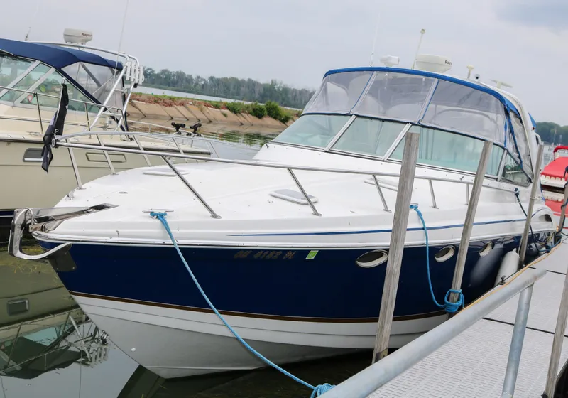 Slide: The Image of 2003 Formula 370 Super Sport boat docked at marina. - 3