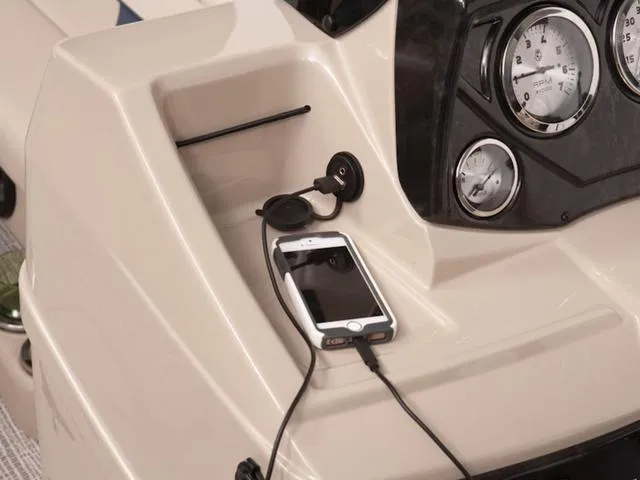 Slide: The Image of Dashboard of 2024 SunCatcher Select 22SS with smartphone charging. - 17