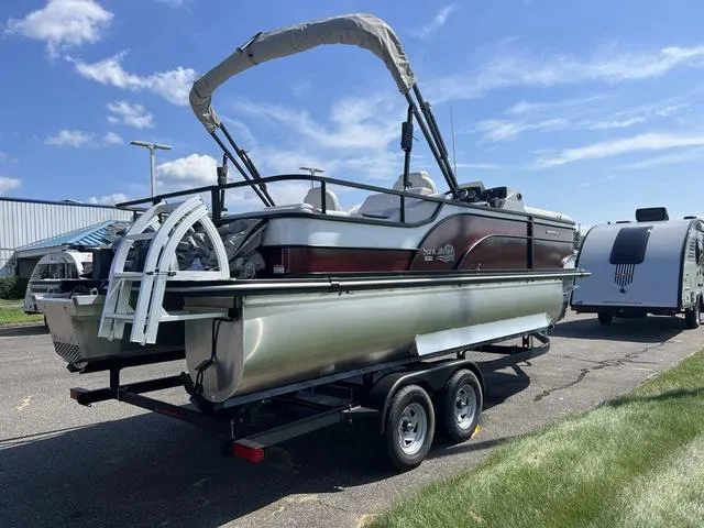 Slide: The Image of 2024 SunCatcher Select 22SS boat seating area with beige upholstery. - 4