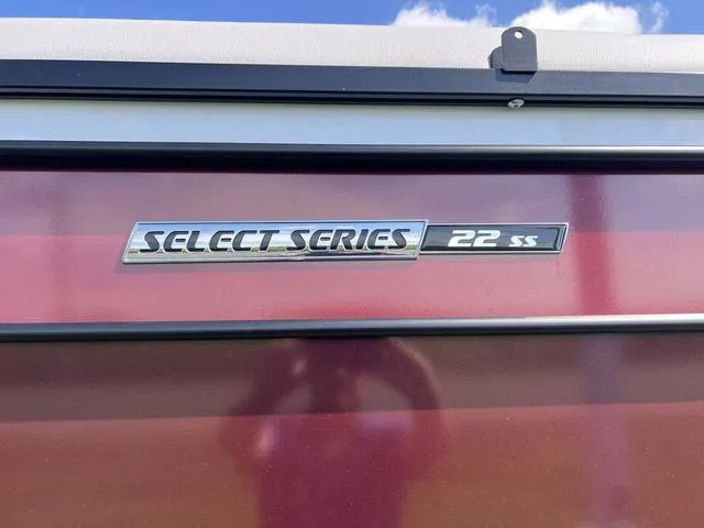 Slide: The Image of 2024 SunCatcher Select 22SS boat dashboard and steering wheel, featuring modern controls and comfortable seating. - 6