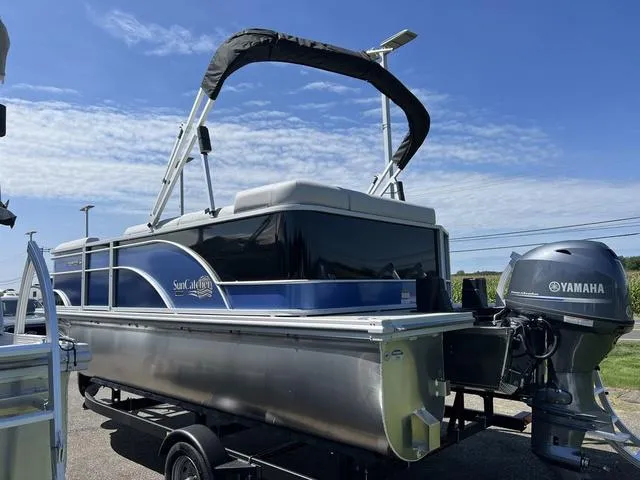 Slide: The Image of 2024 SunCatcher Select 18C pontoon boat on lake, G3 Boats financing offer. - 1