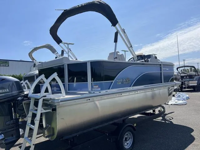 Slide: The Image of 2024 SunCatcher Select 18C pontoon boat on trailer, side view. - 4