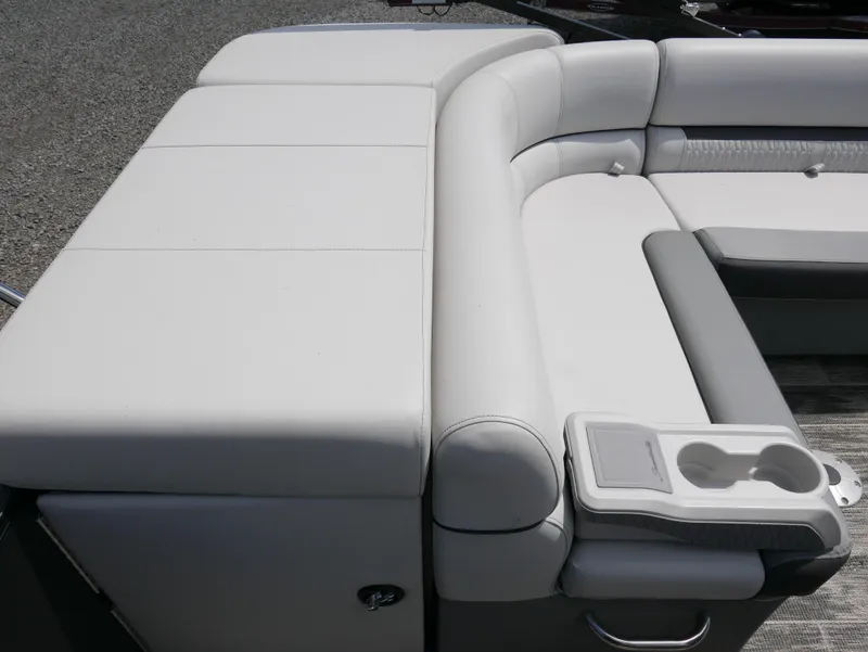 Slide: The Image of 2023 Godfrey SWEETWATER 2086 boat interior seating with cup holders. - 10