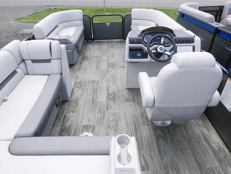 Slide: The Image of 2023 Godfrey SWEETWATER 2086 pontoon boat interior with modern seating and steering console. - 11