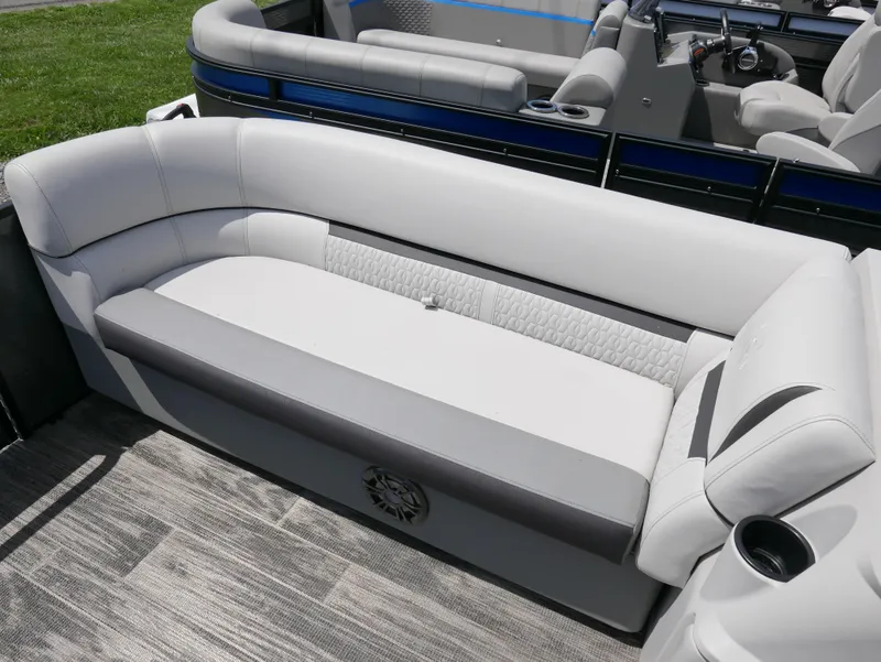 Slide: The Image of 2023 Godfrey SWEETWATER 2086 boat interior with white and gray seating. - 5