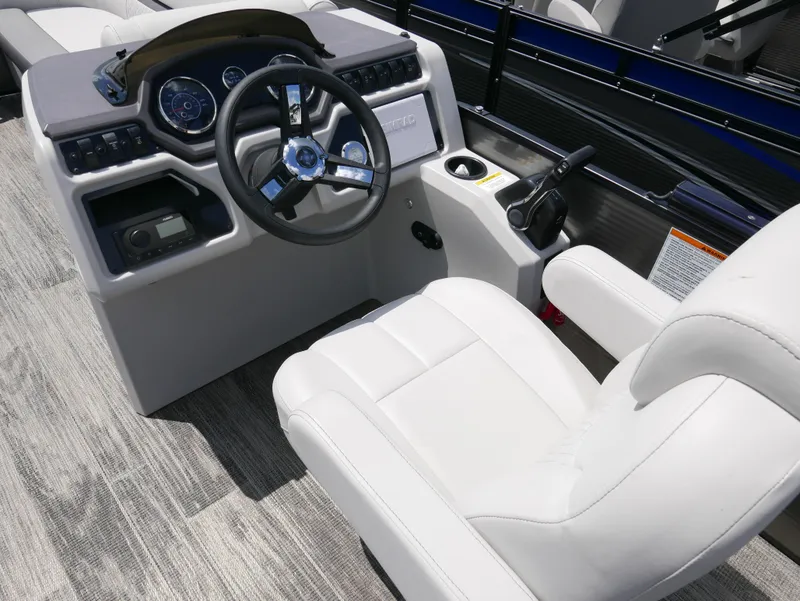 Slide: The Image of 2023 Godfrey SWEETWATER 2086 boat cockpit with steering wheel and captain's chair. - 7