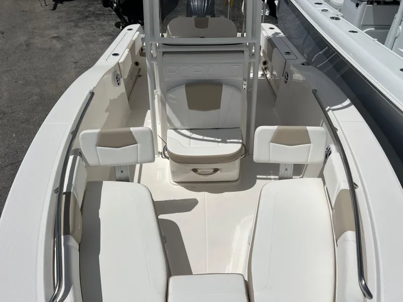 Slide: The Image of 2025 Robalo R200 Center Console boat with spacious seating and modern design. - 10