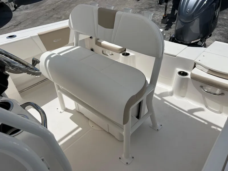 Slide: The Image of 2025 Robalo R200 Center Console boat seating and console area. - 11