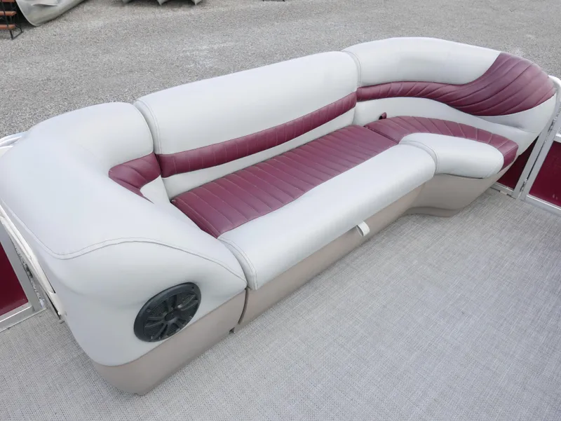 Slide: The Image of 2004 Tracker PB22OB pontoon boat seating with white and maroon upholstery. - 5