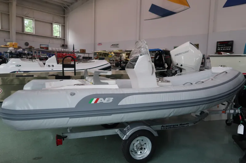 The Image of 2024 AB Inflatables Oceanus 14 VST boat on display in a showroom. - 0