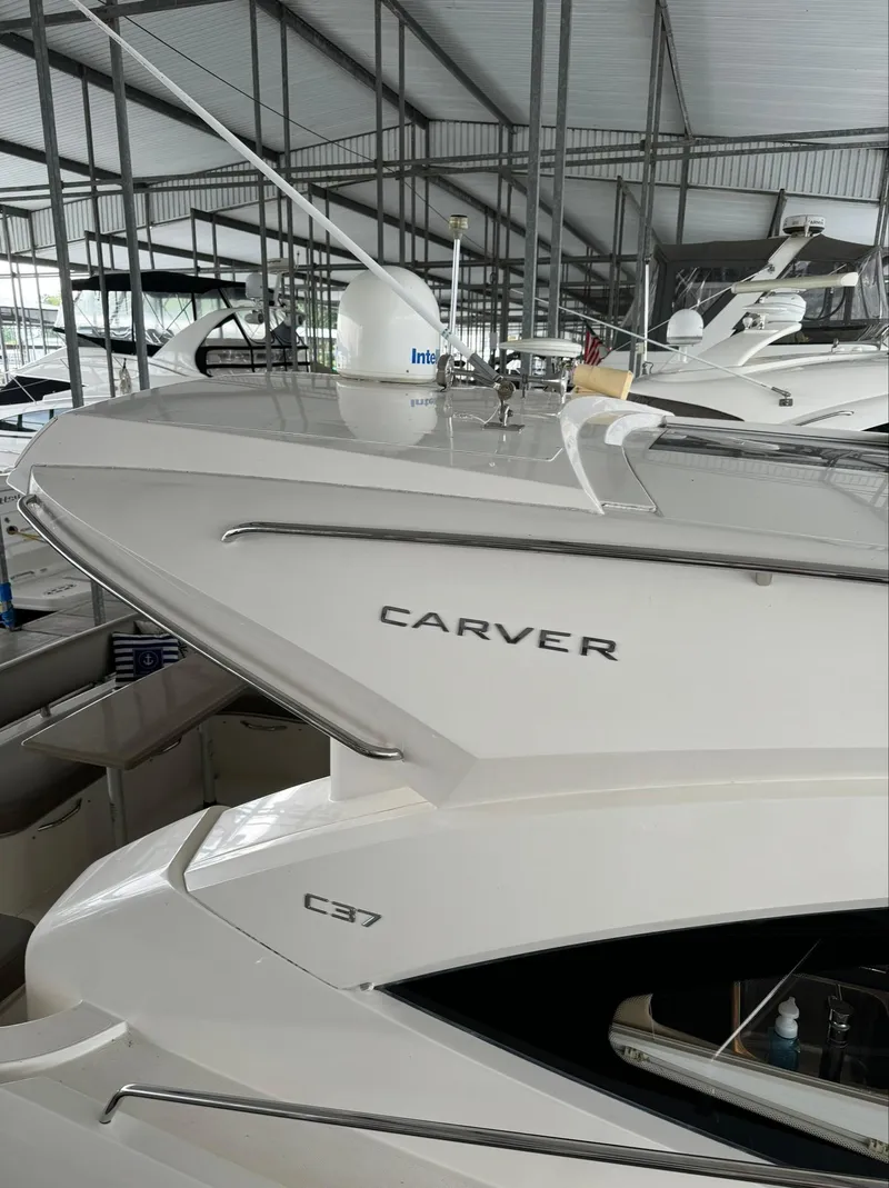Slide: The Image of 2015 Carver C37 Coupe yacht in marina. - 13