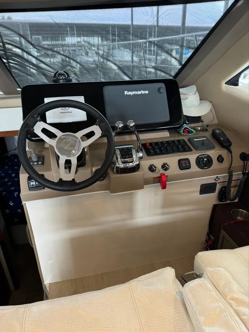 Slide: The Image of Helm of a 2015 Carver C37 Coupe with Raymarine navigation system. - 24