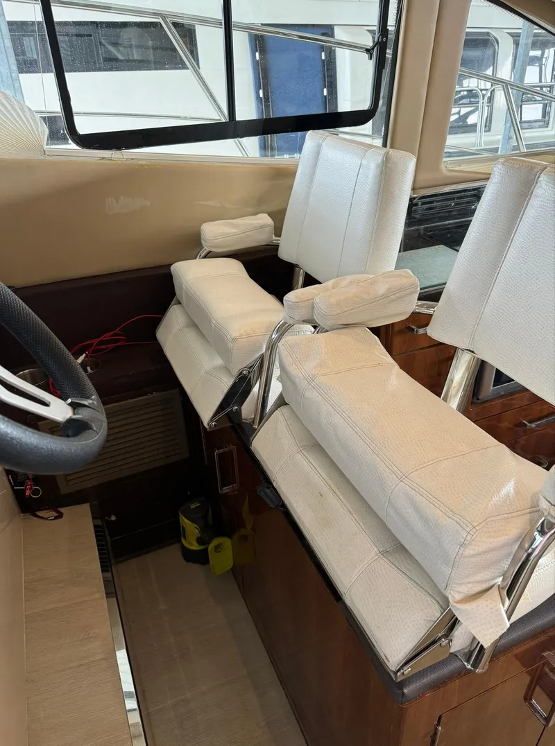 Slide: The Image of Interior seating of a 2015 Carver C37 Coupe yacht. - 28