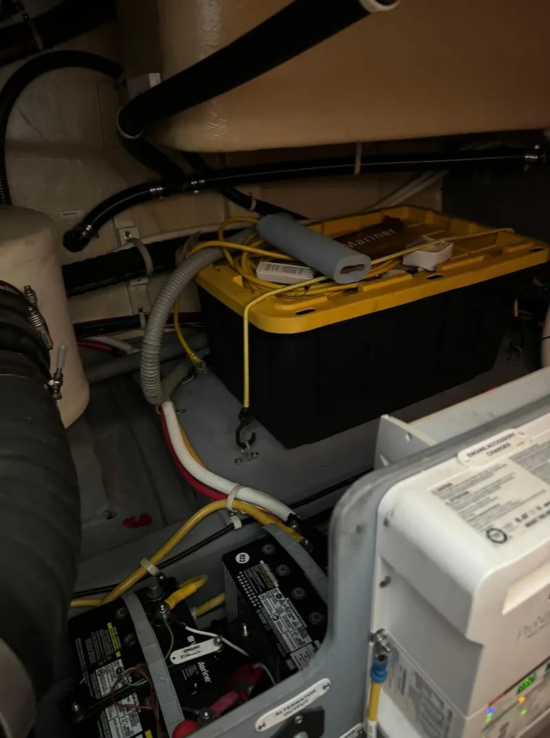 Slide: The Image of Battery compartment of a 2015 Carver C37 Coupe boat. - 45
