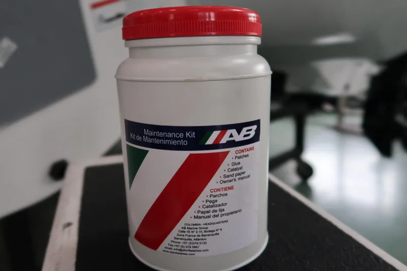 Slide: The Image of AB Inflatables Ventus 9 VL 2024 maintenance kit with red lid. - 4