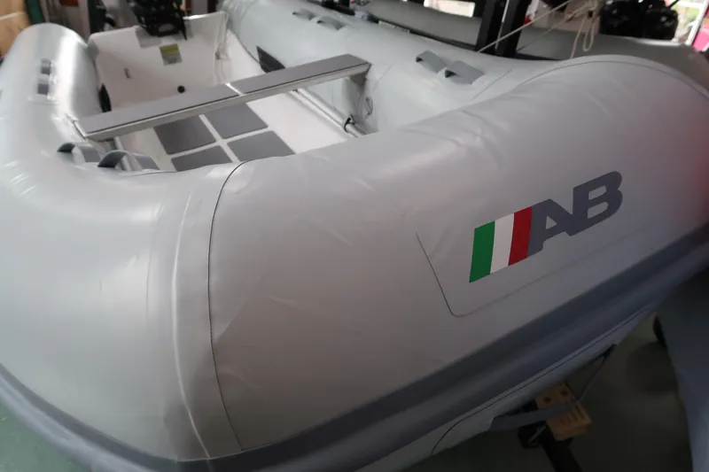 The Image of 2024 AB Inflatables Ventus 10 VL inflatable boat, close-up view of interior and logo. - 0