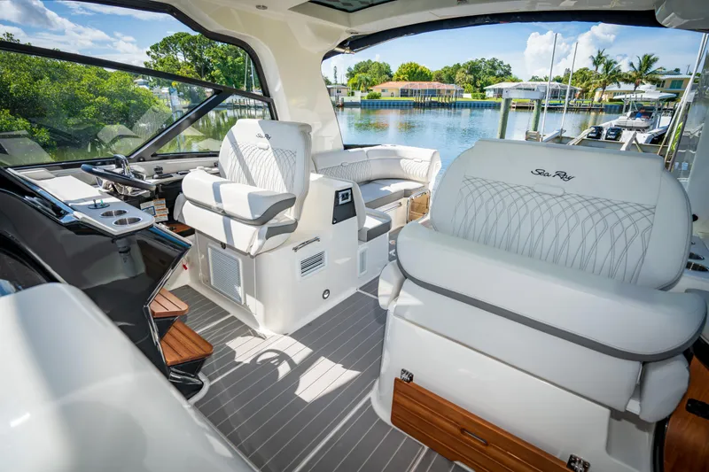 Slide: The Image of Interior of 2023 Sea Ray Sundancer 370 OB luxury yacht with white seating. - 20