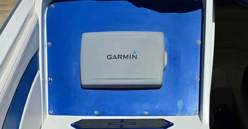 Slide: The Image of Garmin navigation system on a 1997 Outerlimits 37 Stiletto boat. - 14