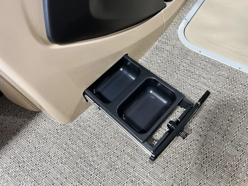 Slide: The Image of Barletta CABRIO C24UC 2025 retractable cup holders on beige carpet. - 14