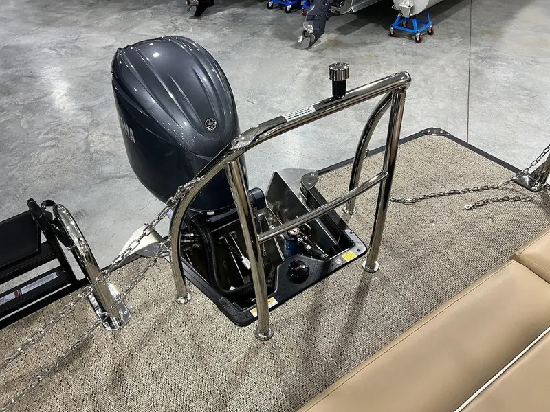 Slide: The Image of 2025 Barletta CABRIO C24UC pontoon boat with outboard motor and stainless steel railing. - 19