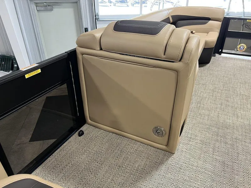 Slide: The Image of 2025 Barletta CABRIO C24UC interior with beige leather seating and carpeted flooring. - 26