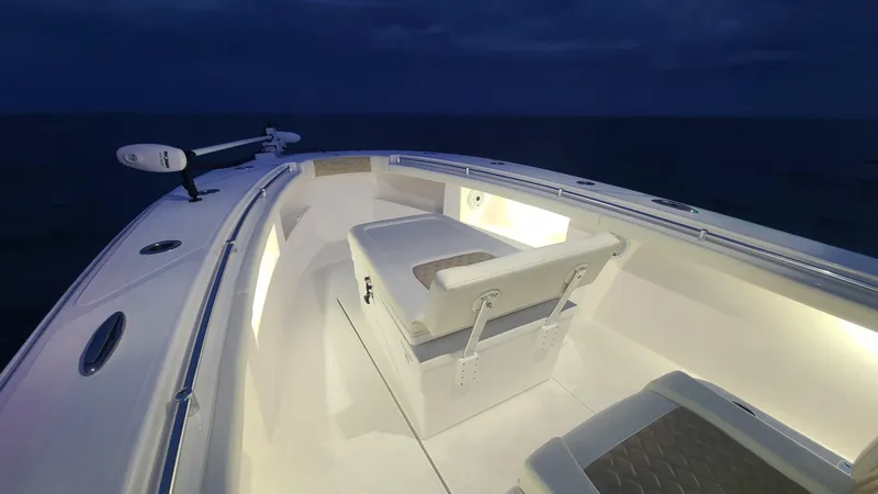 Slide: The Image of 2022 Front Runner 33 Center Console boat interior at night. - 21