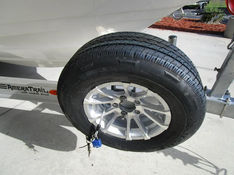 Slide: The Image of Close-up of a 2024 Pathfinder TRS 2200 boat trailer tire. - 11