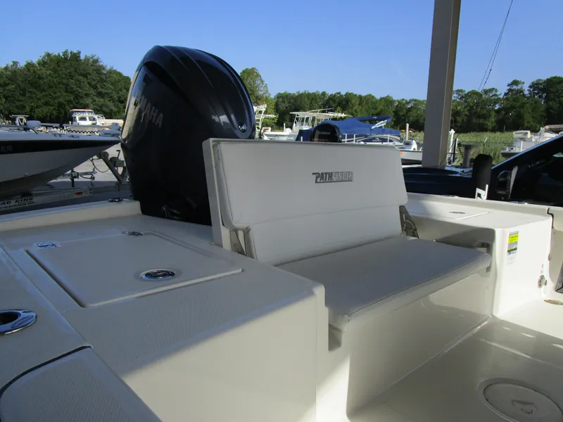 Slide: The Image of 2024 Pathfinder TRS 2200 boat with Yamaha engine at marina. - 12