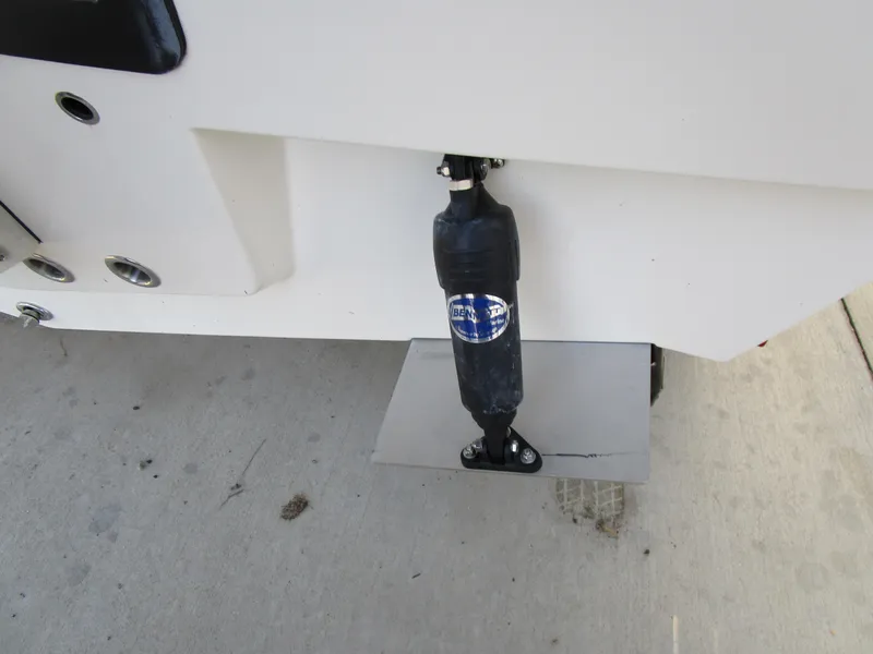 Slide: The Image of Close-up of a 2024 Pathfinder TRS 2200 boat trim tab actuator. - 14
