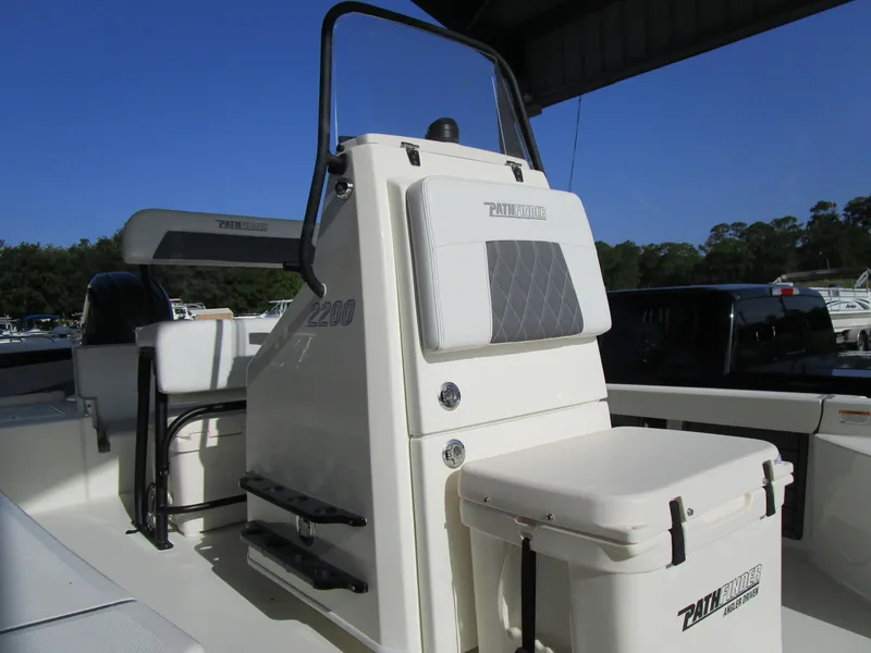 Slide: The Image of 2024 Pathfinder TRS 2200 boat interior with seating and storage. - 3
