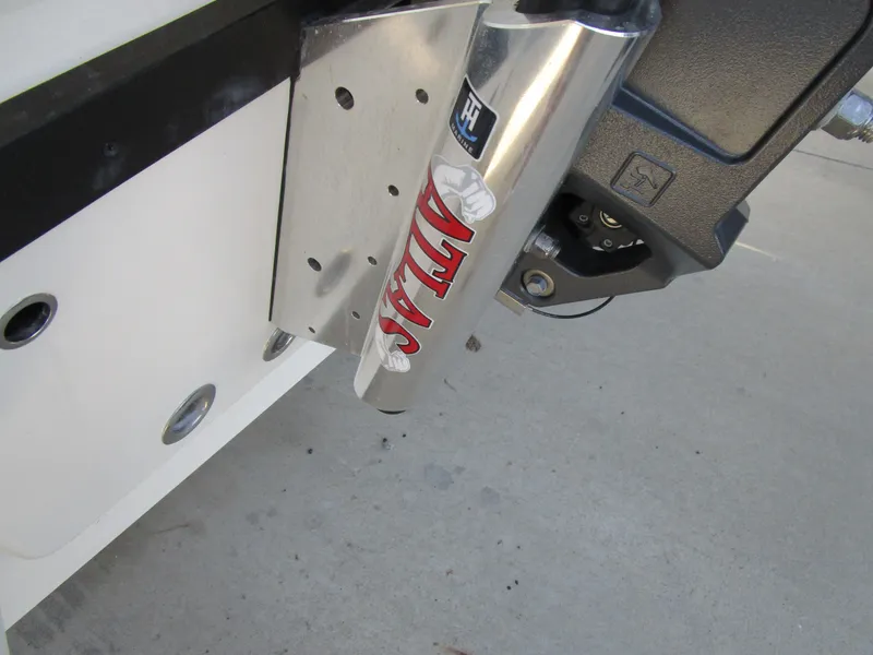 Slide: The Image of Close-up of a 2024 Pathfinder TRS 2200 boat's hydraulic jack plate. - 8