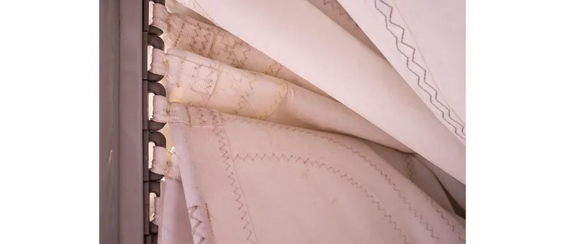 Slide: The Image of Close-up of folded sails on a 1980 Sceptre 36 Athena boat. - 11