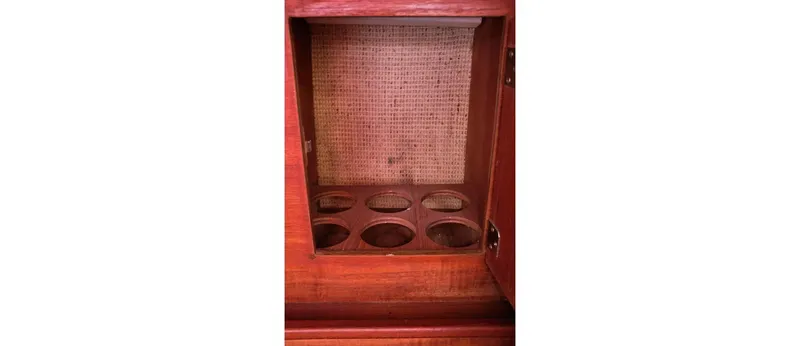 Slide: The Image of Wooden cabinet with circular compartments, Sceptre 36 Athena, 1980 model. - 28