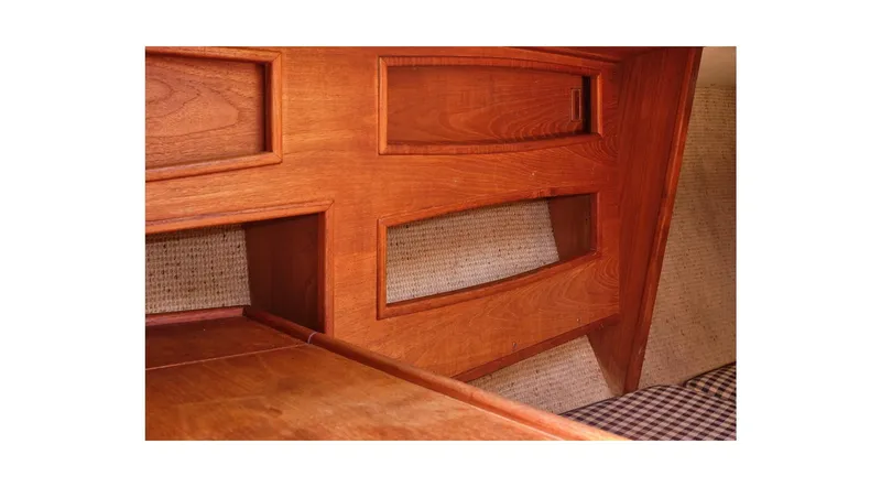 Slide: The Image of Interior woodwork of 1980 Sceptre 36 Athena sailboat, featuring elegant wooden panels. - 36