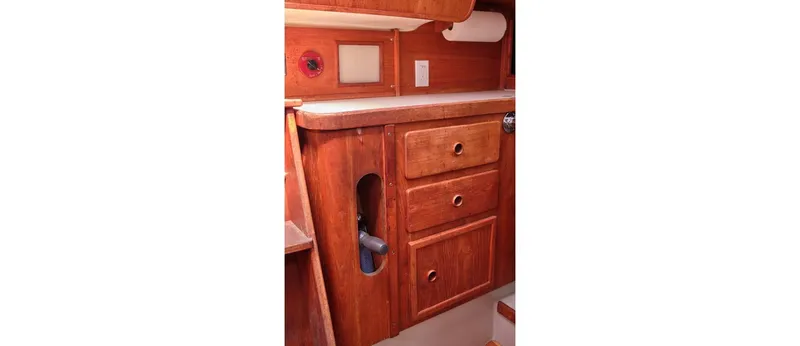 Slide: The Image of Wooden interior cabinetry of 1980 Sceptre 36 Athena sailboat, featuring drawers and countertop. - 45