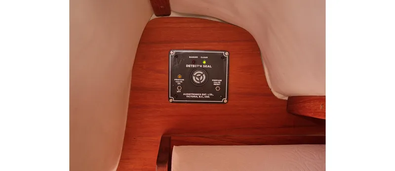 Slide: The Image of Control panel on 1980 Sceptre 36 Athena yacht, featuring wooden interior. - 48