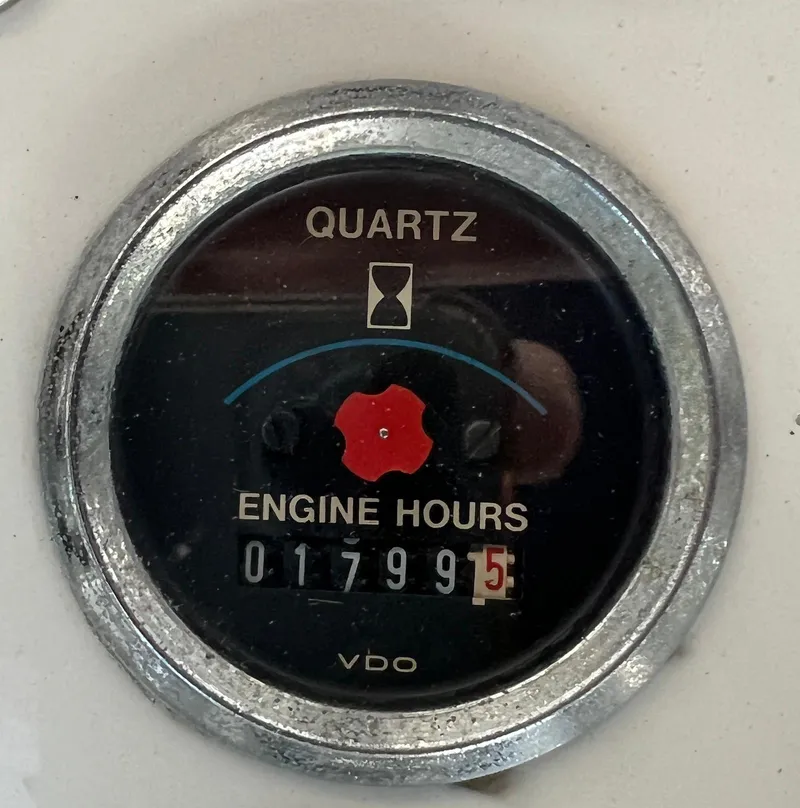 Slide: The Image of 1986 Midnight Lace 44 Flybridge Express Cruiser engine hour meter showing 1799.5 hours. - 30