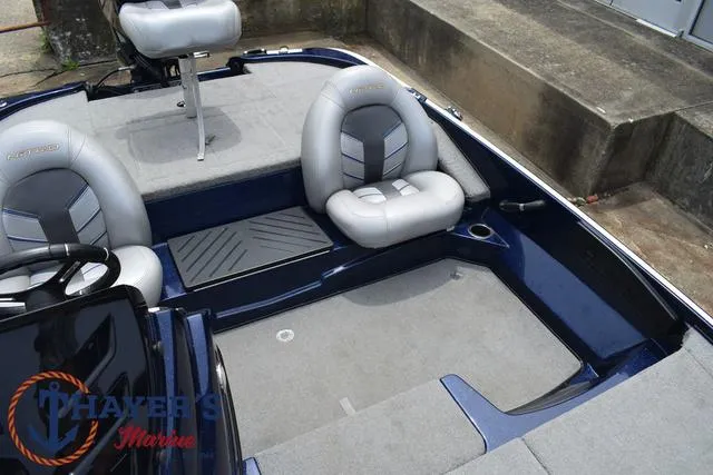 Slide: The Image of 2021 Nitro Z17 boat interior with gray seating and carpet. - 15