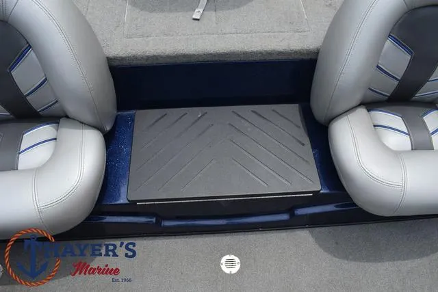 Slide: The Image of 2021 Nitro Z17 boat interior with gray seats and Thayer's Marine logo. - 18