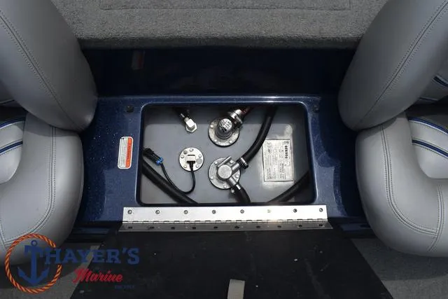 Slide: The Image of 2021 Nitro Z17 boat fuel system compartment with hoses and fittings. - 19