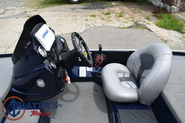 Slide: The Image of 2021 Nitro Z17 boat interior with steering console and seating. - 23