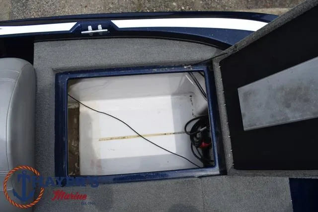 Slide: The Image of Open storage compartment in a 2021 Nitro Z17 boat. - 28