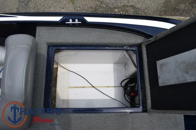 Slide: The Image of Open storage compartment in a 2021 Nitro Z17 boat. - 29