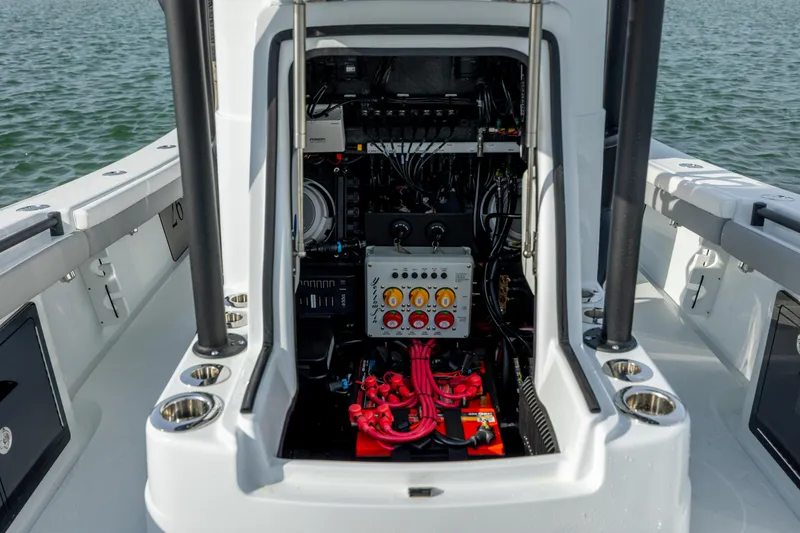 Slide: The Image of 2025 Yellowfin 26 Hybrid boat interior showing electrical system and wiring. - 27
