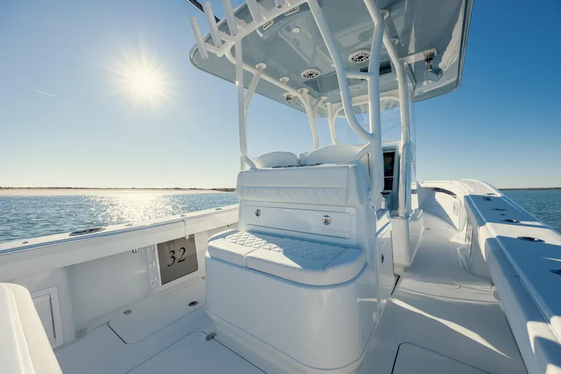 Slide: The Image of 2025 Yellowfin 32 boat interior with sunlit ocean view. - 14