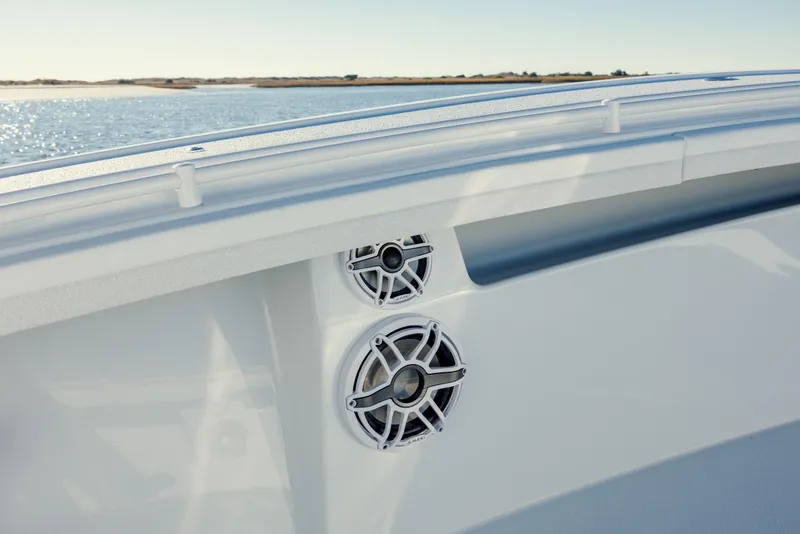 Slide: The Image of 2025 Yellowfin 32 boat speakers with ocean view. - 29