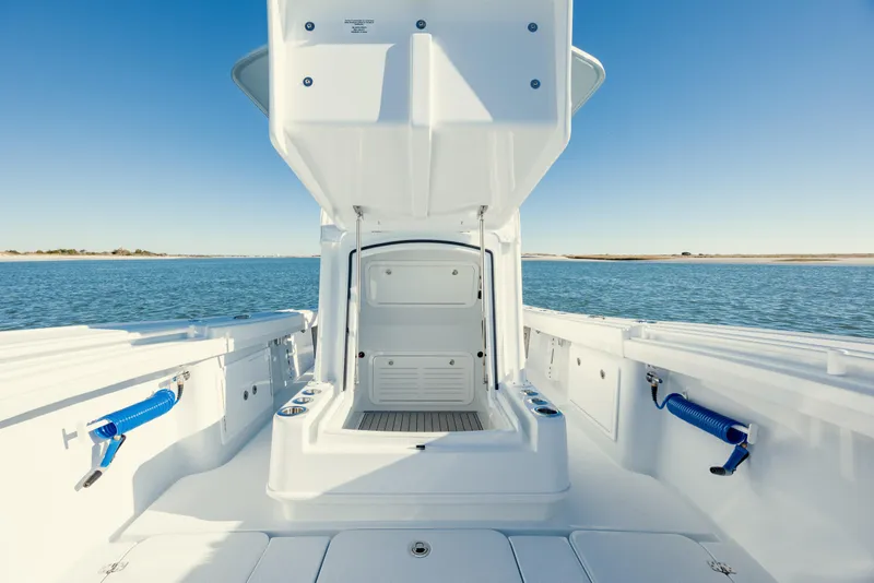 Slide: The Image of 2025 Yellowfin 32 boat interior with open storage, ocean view. - 31